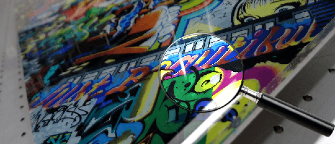 Acrylic print of multicolored urban graffiti.