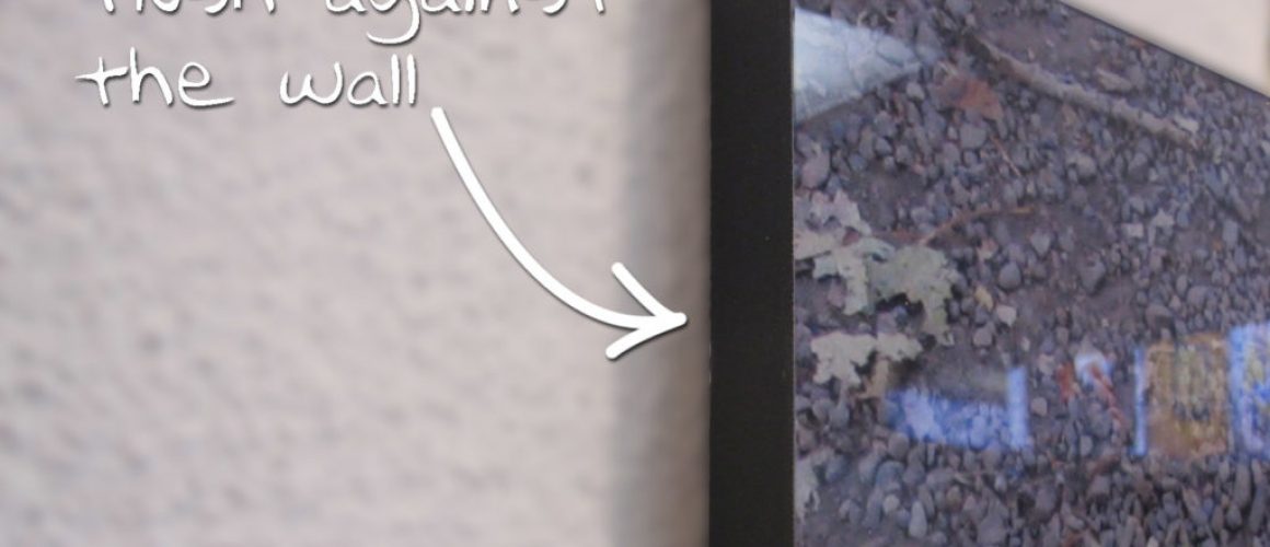 Image shows 1" mount that lies flush against wall.