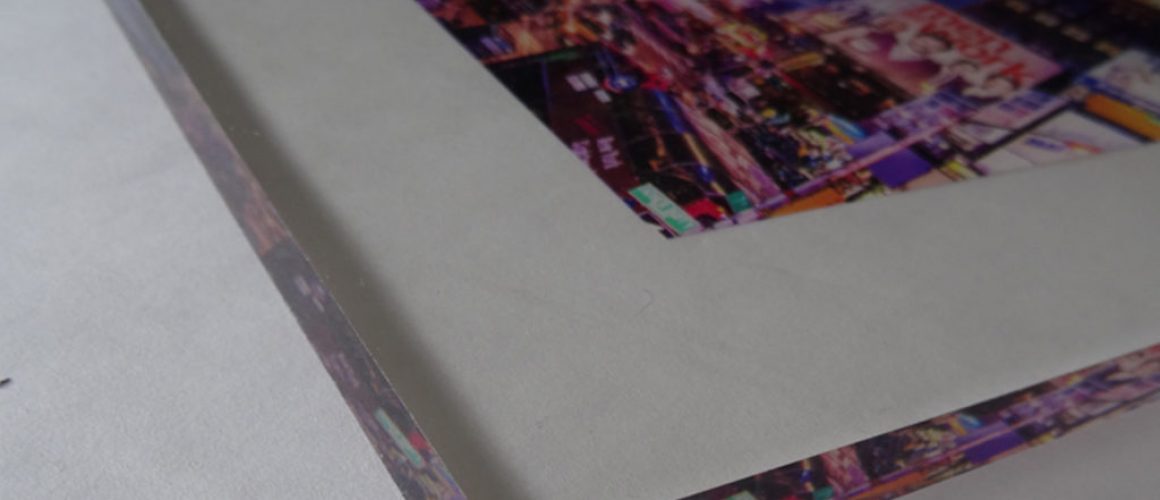 Image shows 3/8" thickness of acrylic print.