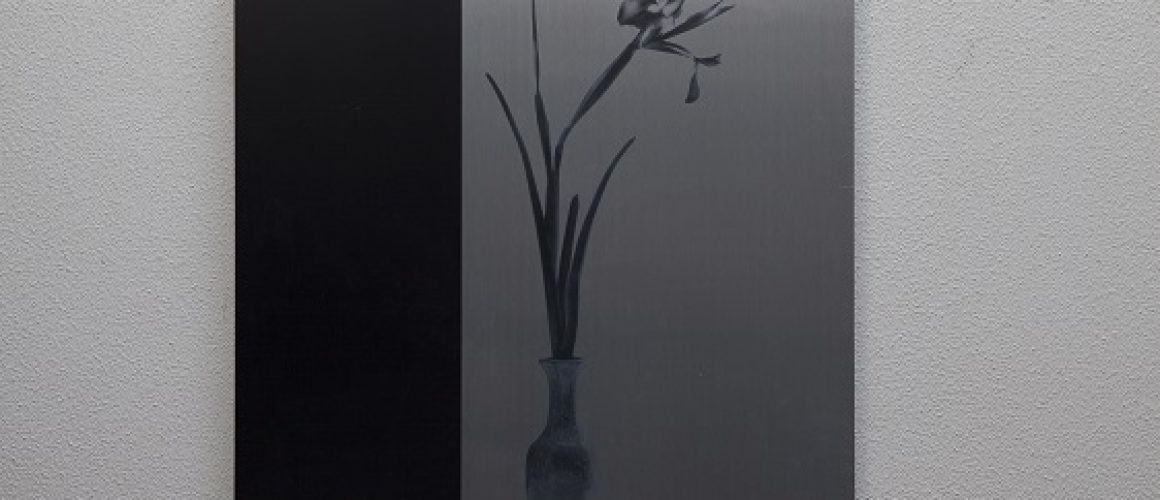 Brushed metal print of flower in vase with a thick black border on the left.