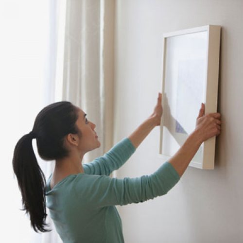 Hanging pictures on walls